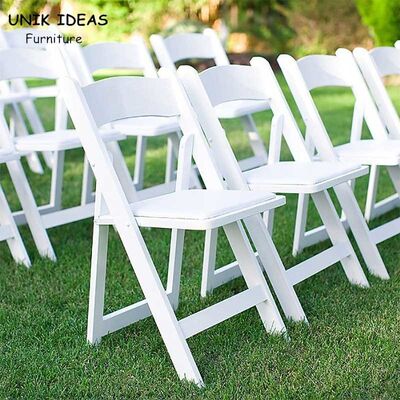 अच्छी कीमत White Resin Folding Wedding Chair Hire Outdoor Lawn Hotel Event 44x43x78cm ऑनलाइन