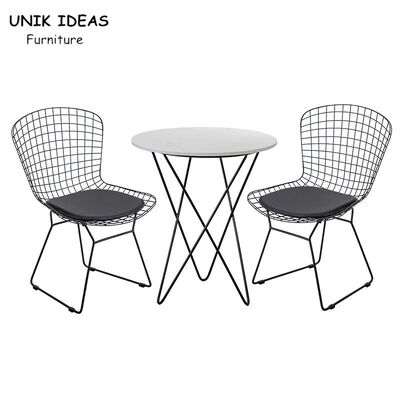 अच्छी कीमत Wire Metal Frame Dining Chairs And Table With Leather Cushion Black UK-LM006 ऑनलाइन